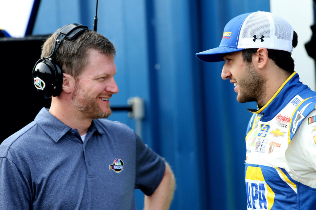 Dale Earnhardt Jr. talks to Chase Elliott.